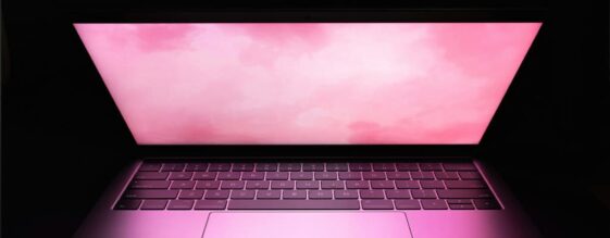 A laptop open on a desk