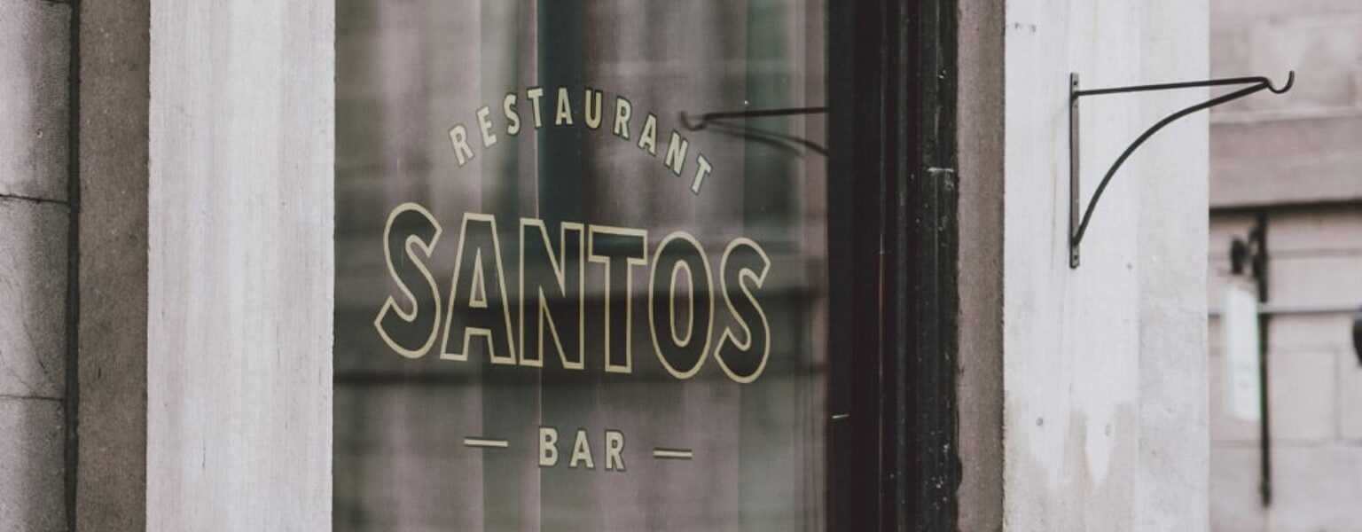 Santos Restaurant vinyl business sign