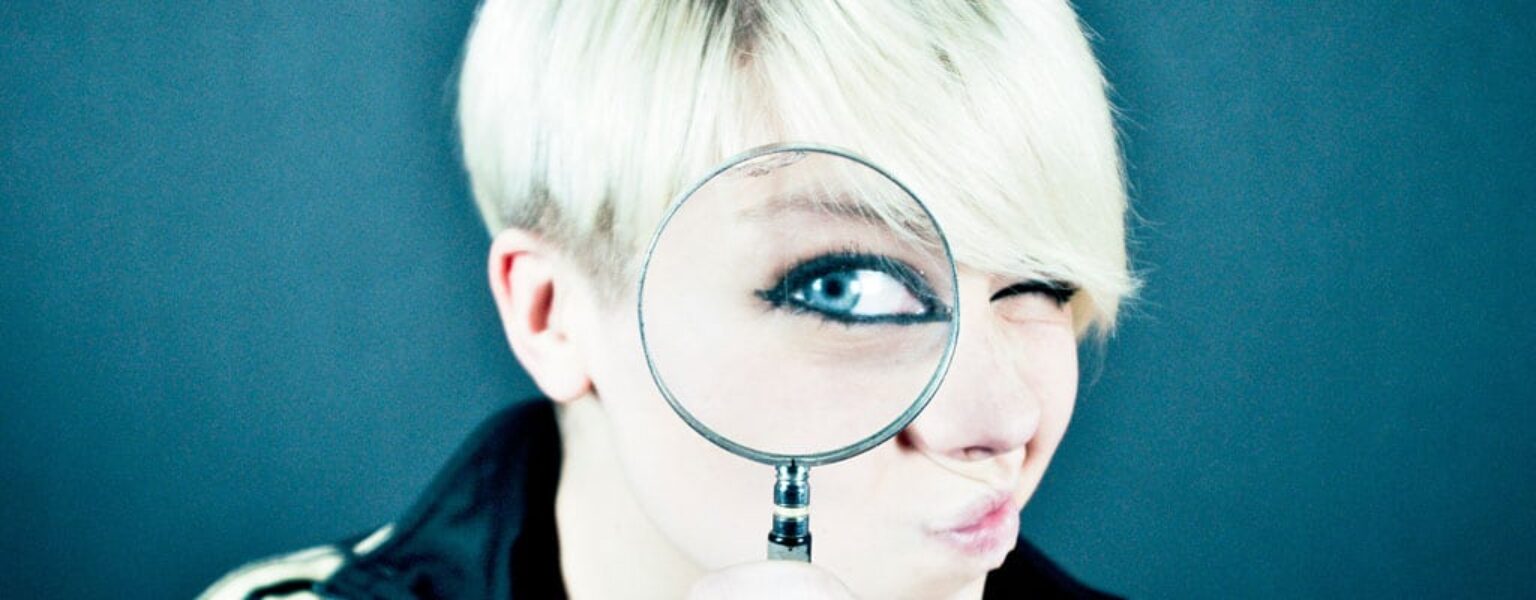 Woman with a magnifying glass