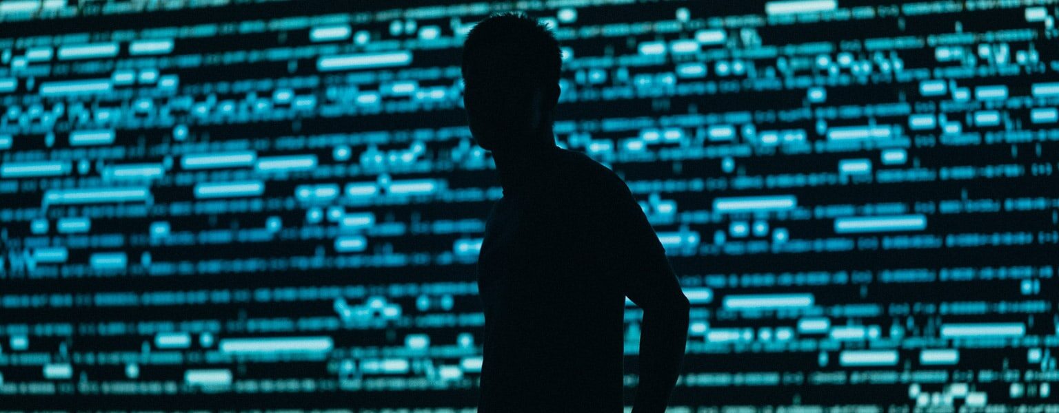 Silhouette of a man representing social engineering attacks